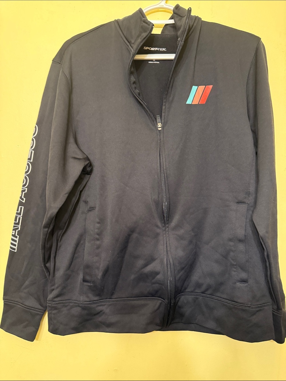 Sport-Tek Black Track Jacket with Teal and Red Stripe Patch
